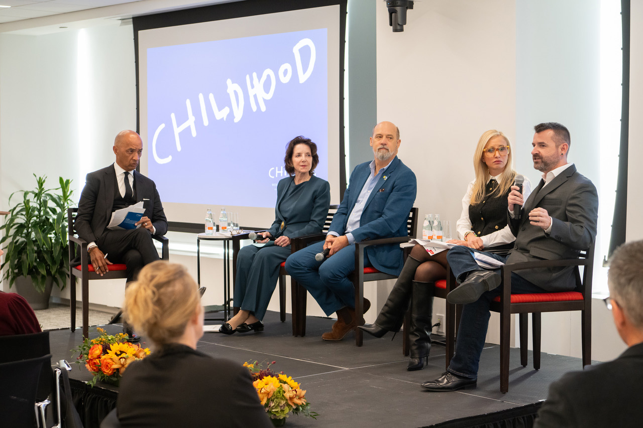 Aaron Stone on a panel with the World Childhood Foundation